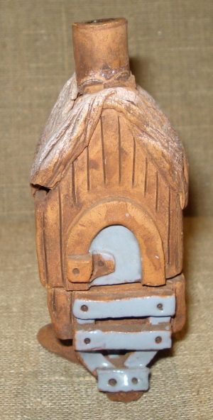 Žvakidė "Namelis ant vištos kojelės"