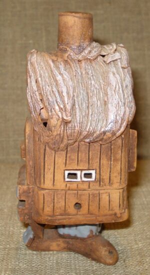 Žvakidė "Namelis ant vištos kojelės"