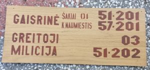 Užrašas "Gaisrinė.Greitoji.Milicija"