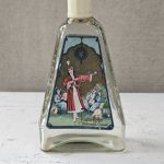 Kvepalų buteliukas su etikete