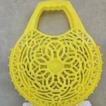 Geltona plastikinė rankinė
