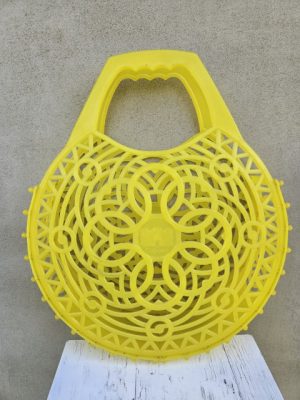 Geltona plastikinė rankinė