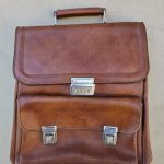 Rudas mokyklinis portfelis