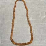 "Gintariniai" karoliai